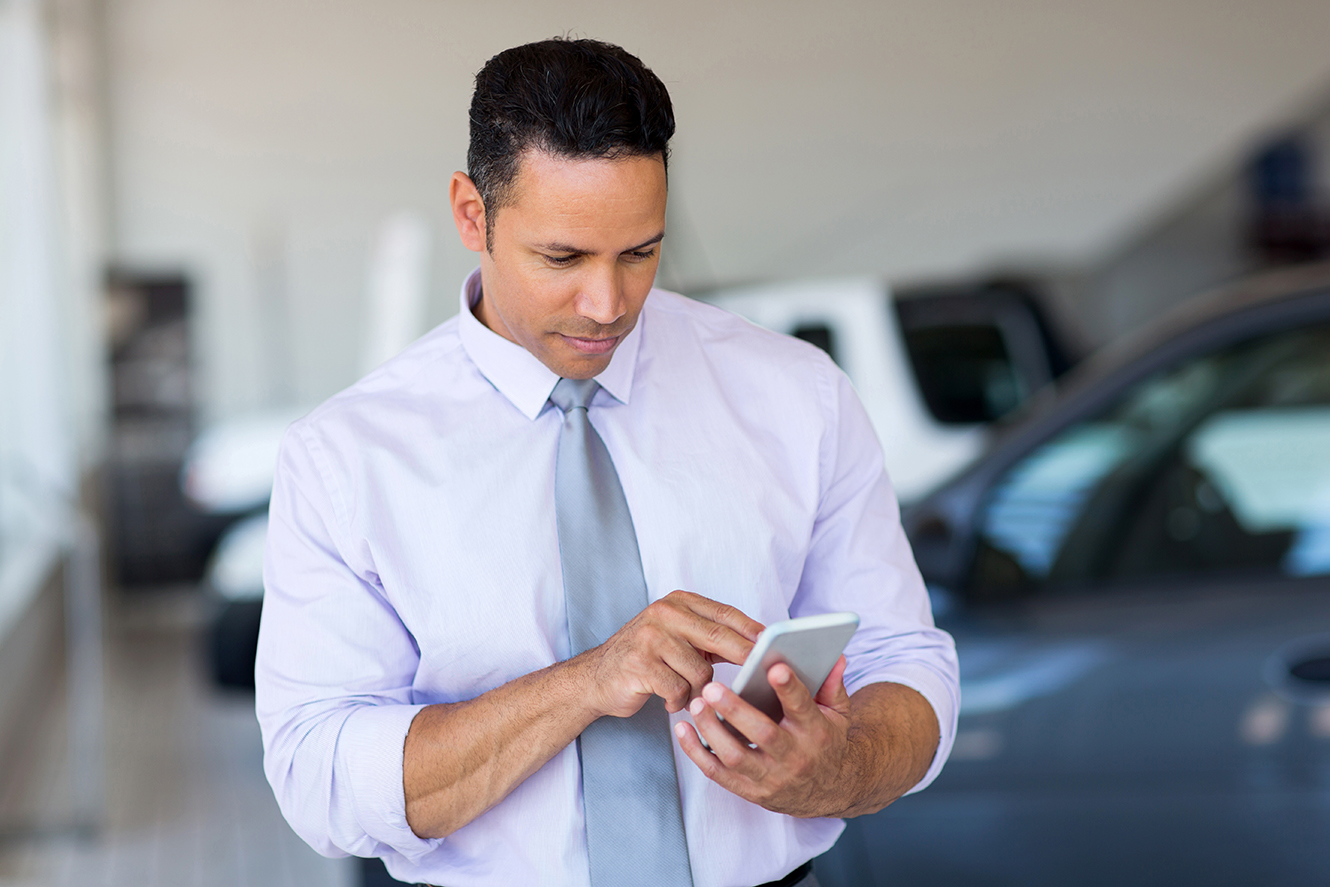 a man holding a cell phone