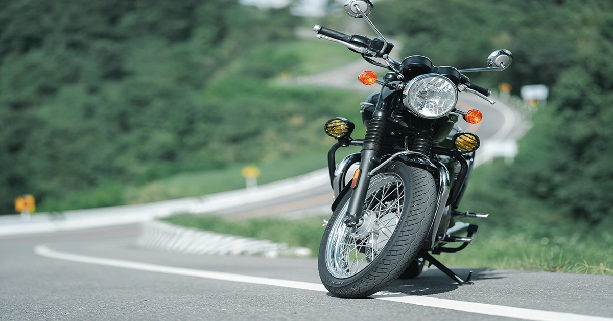 a motorcycle parked on the side of a road